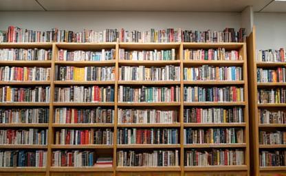 Rows of colorful books on display in a bookstore